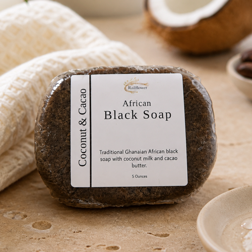 Bar of African Black Soap with a label on a textured surface