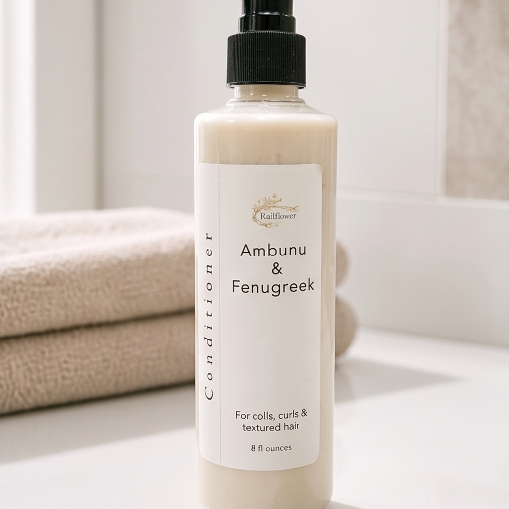 Bottle of conditioner with 'Ambunu & Fenugreek' label on a neutral background