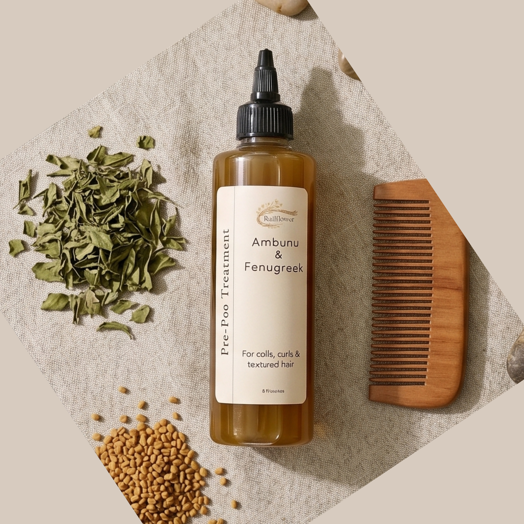 Hair treatment bottle with ingredients and a comb on a textured surface
